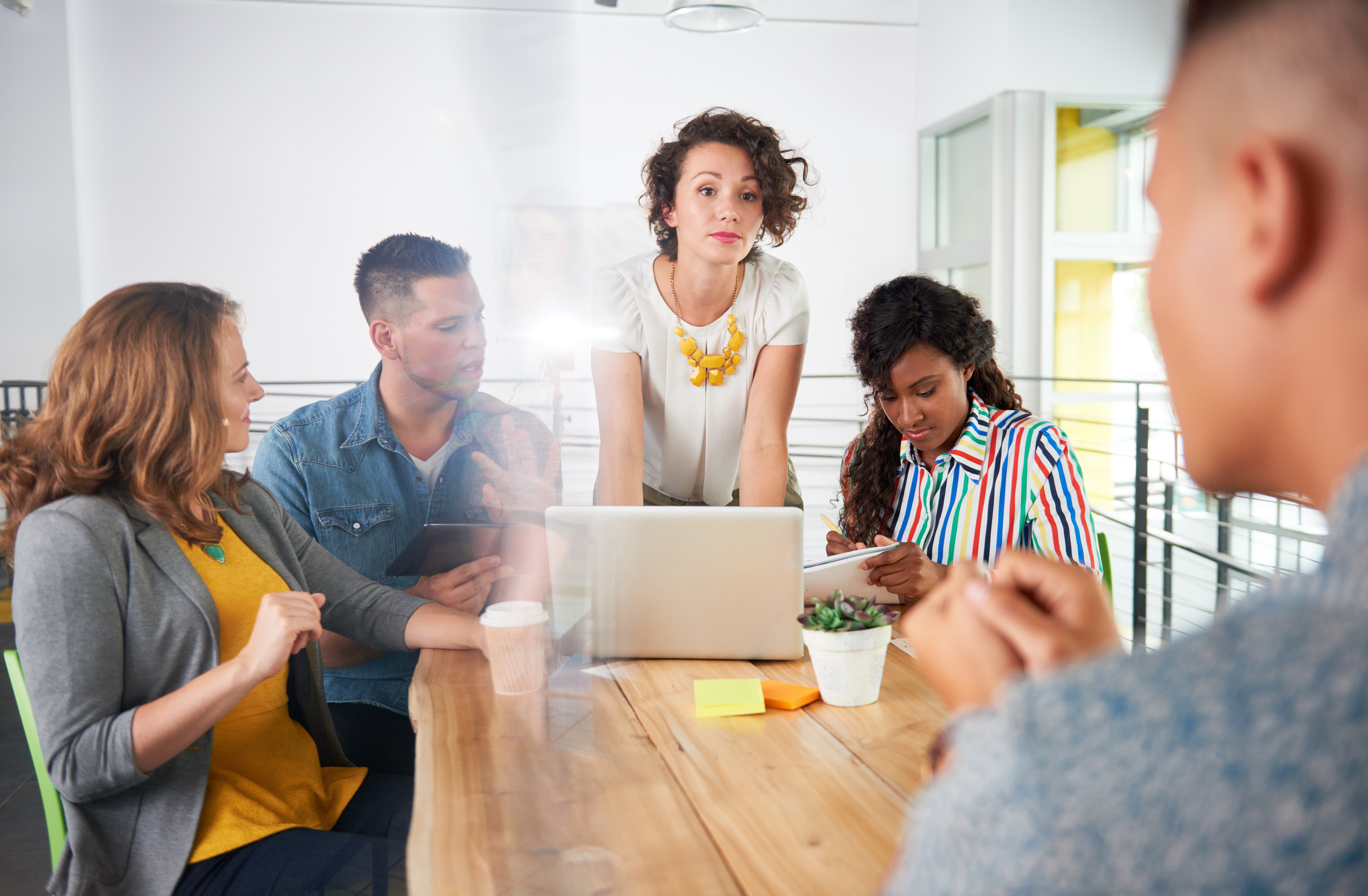 ethnic-woman-leading-business-discussion