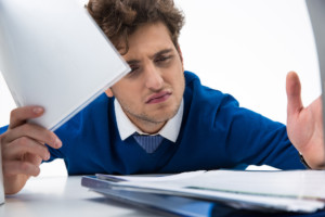 Tired businessman working in the office