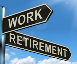 Work Or Retire Signpost Showing Choice Of Working Or Retirement