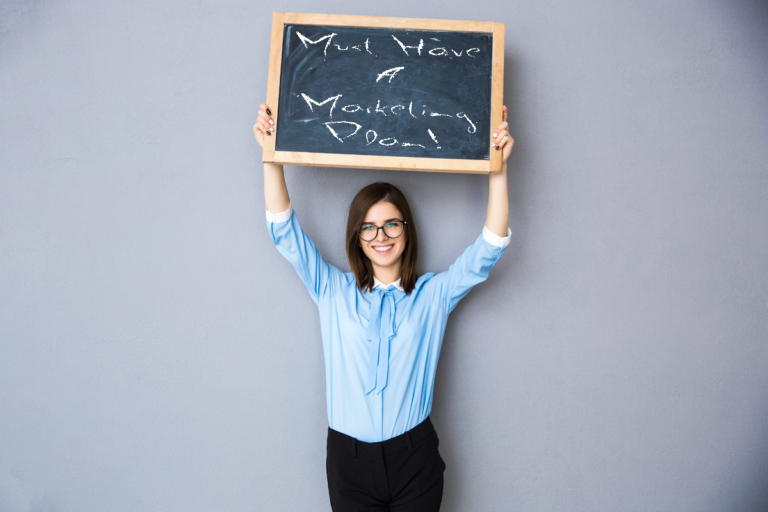 Woman Holding Chalkboard Marketing Sign