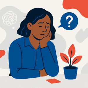 Black woman sitting at a desk with a thoughtful, worried expression and abstract question bubble in background.